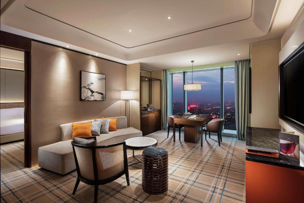 TV a/nebo společenská místnost v ubytování Hilton Fuzhou