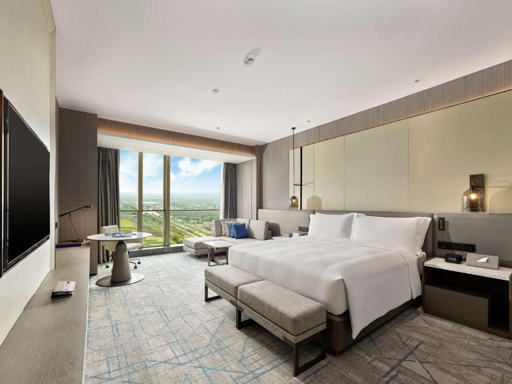 TV a/nebo společenská místnost v ubytování DoubleTree by Hilton Qidong