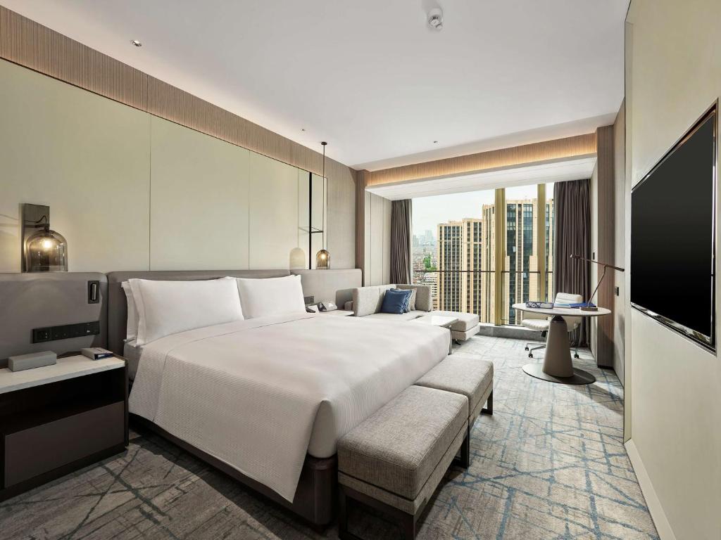 TV a/nebo společenská místnost v ubytování DoubleTree by Hilton Qidong
