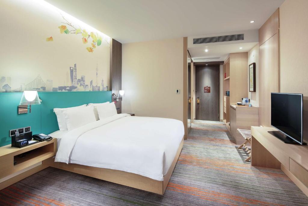 TV a/nebo společenská místnost v ubytování Hilton Garden Inn Shanghai Hongqiao NECC