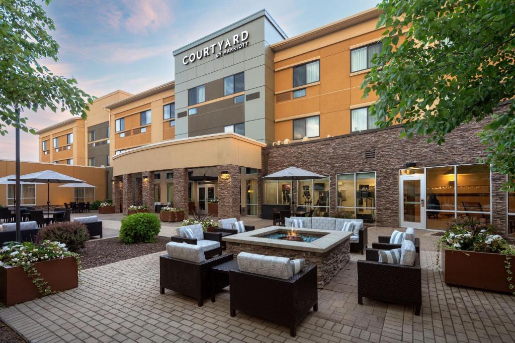 a rendering of a courtyard at the courtyard hotel at Courtyard Mankato Hotel & Event Center in Mankato