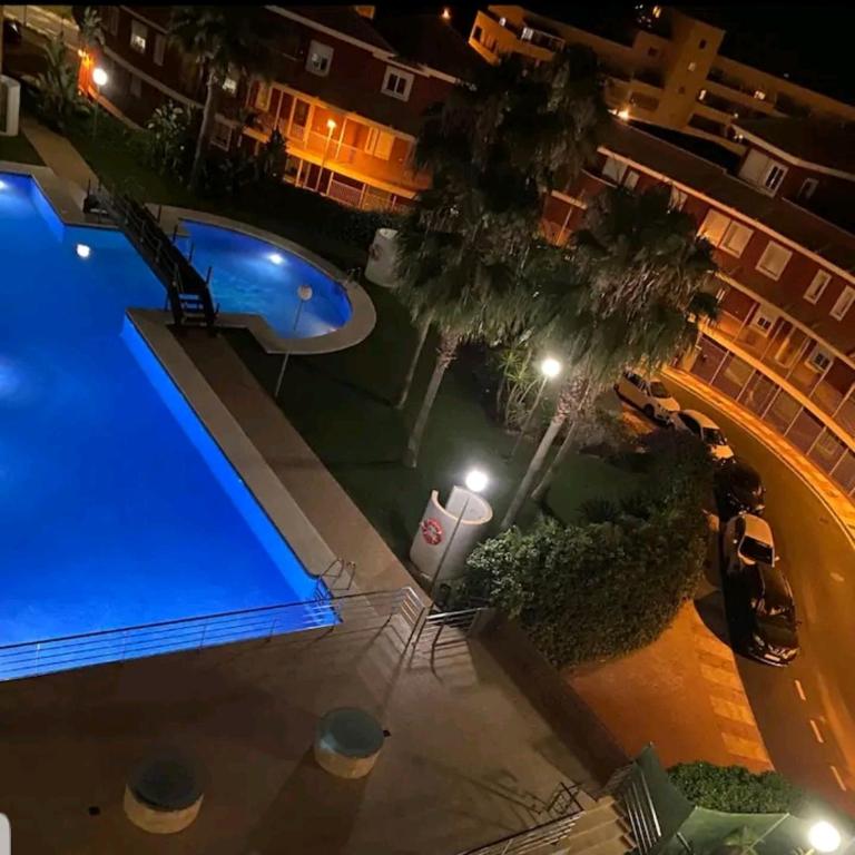 Bazén v ubytování ATICO AGUADULCE nebo v jeho okolí