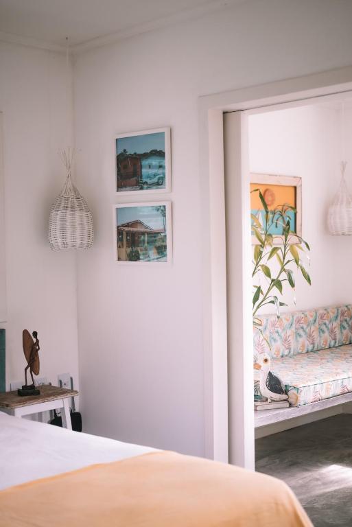 Postel nebo postele na pokoji v ubytování Cactus Lodge Pipa
