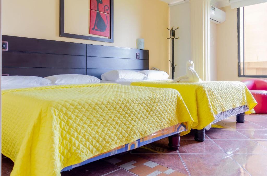 Postel nebo postele na pokoji v ubytování Hostal Antares