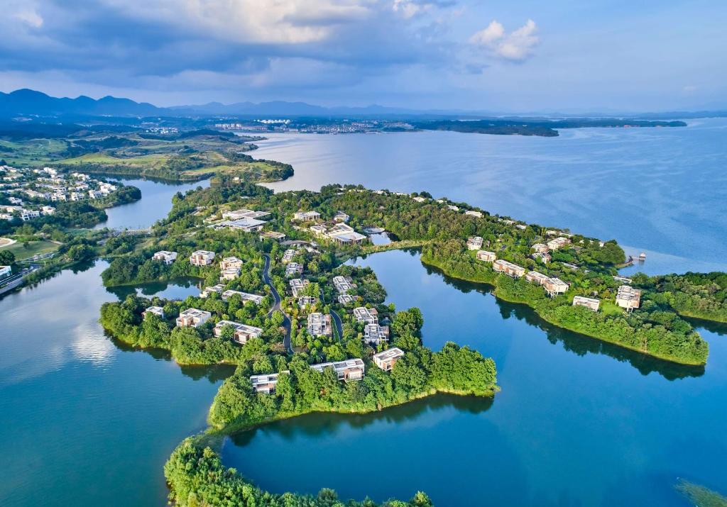 an aerial view of a small island in the water at Lushan West Sea Resort, Curio Collection by Hilton in Jiujiang