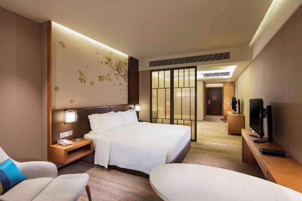 TV a/nebo společenská místnost v ubytování Hilton Garden Inn Shiyan
