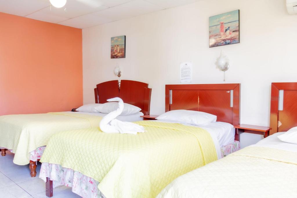 Postel nebo postele na pokoji v ubytování Hostal Antares