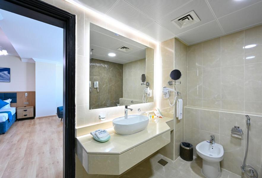 Vannituba majutusasutuses Saray Musheireb Hotel Suites and Apartment