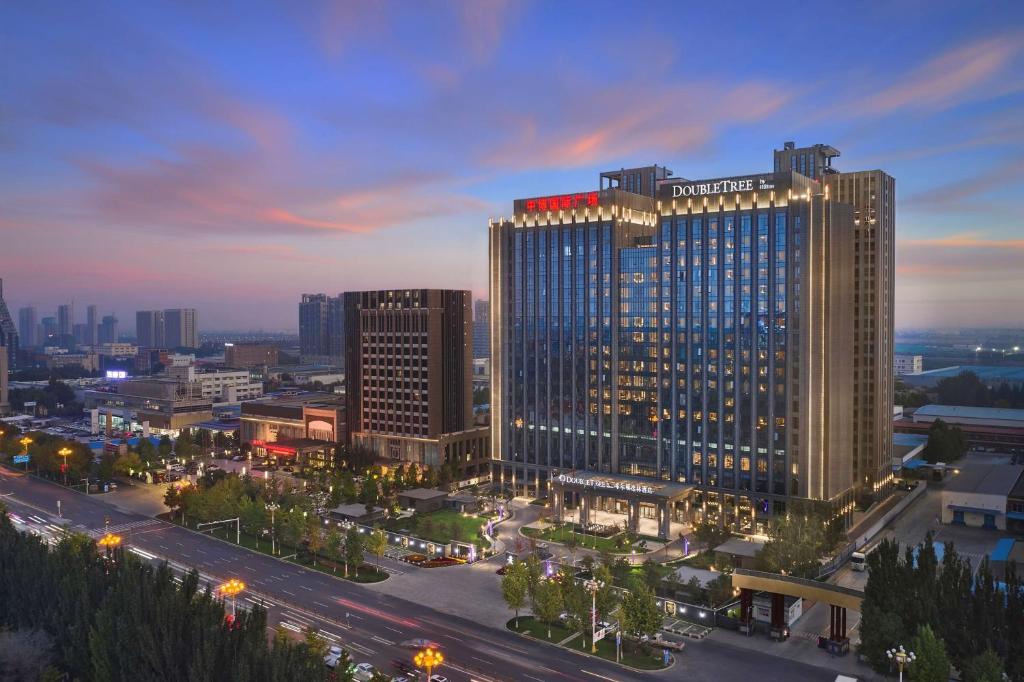 a view of a large building in a city at Doubletree By Hilton Baoding in Baoding