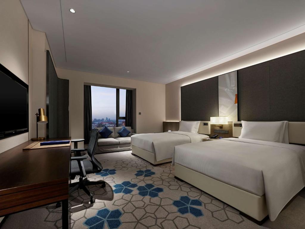 TV a/nebo společenská místnost v ubytování Doubletree By Hilton Baoding
