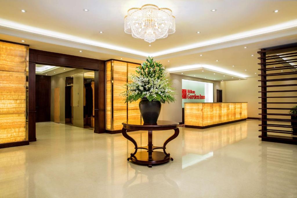 The lobby or reception area at Hilton Garden Inn Hanoi