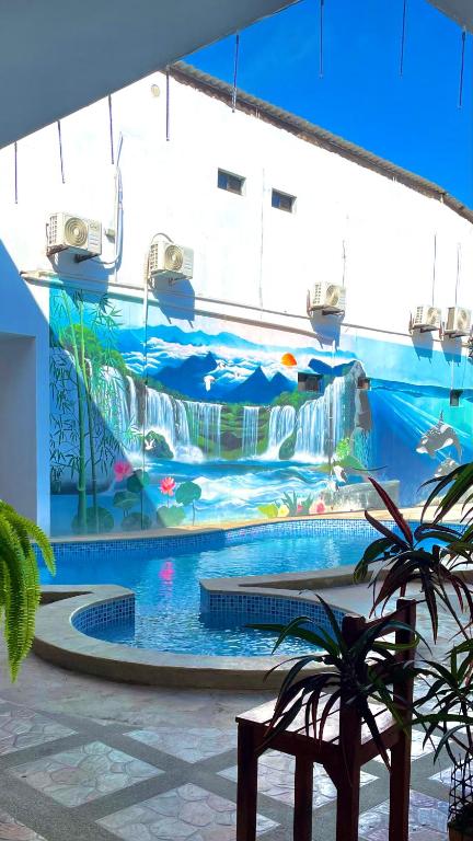 Bazén v ubytování Hostal Laurita Beach nebo v jeho okolí