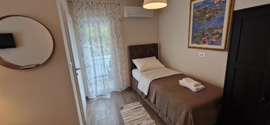 Postel nebo postele na pokoji v ubytování Portofino - With Free Parking
