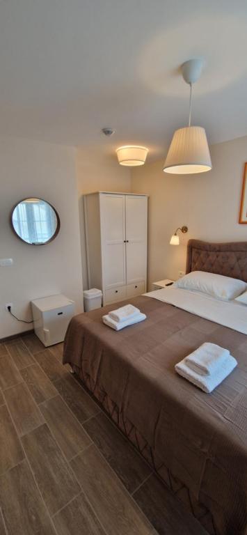 Postel nebo postele na pokoji v ubytování Portofino - With Free Parking