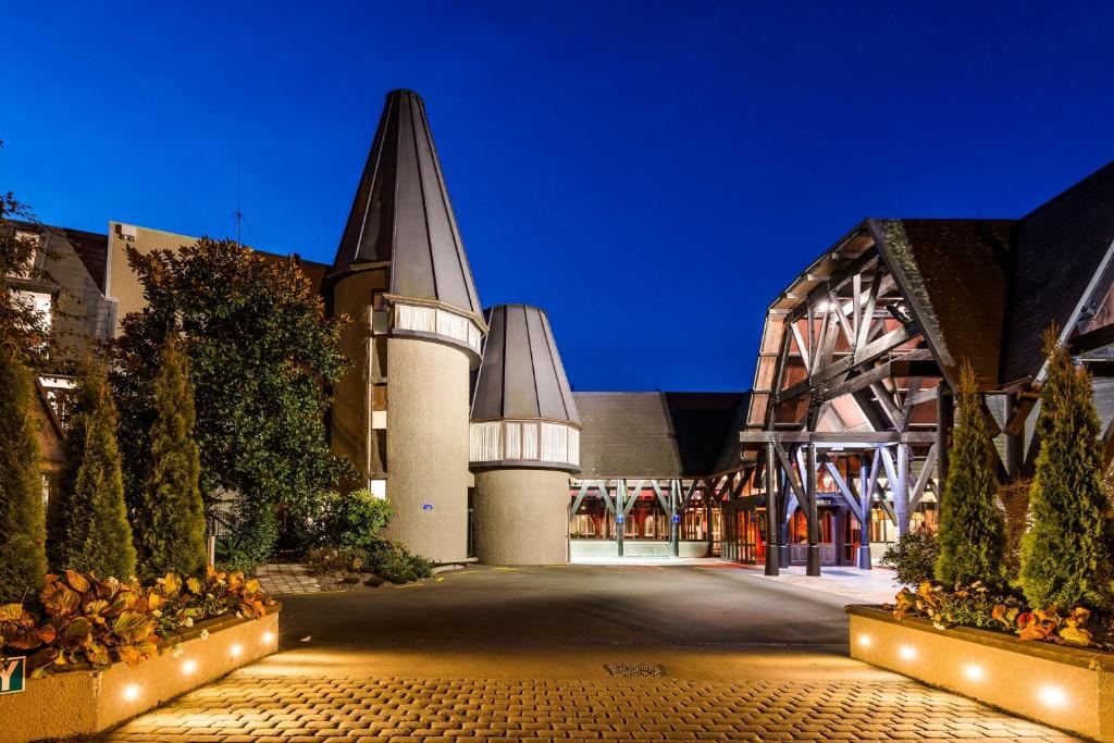 an exterior view of a church at night at Chateau On The Park - Christchurch, A Doubletree By Hilton in Christchurch