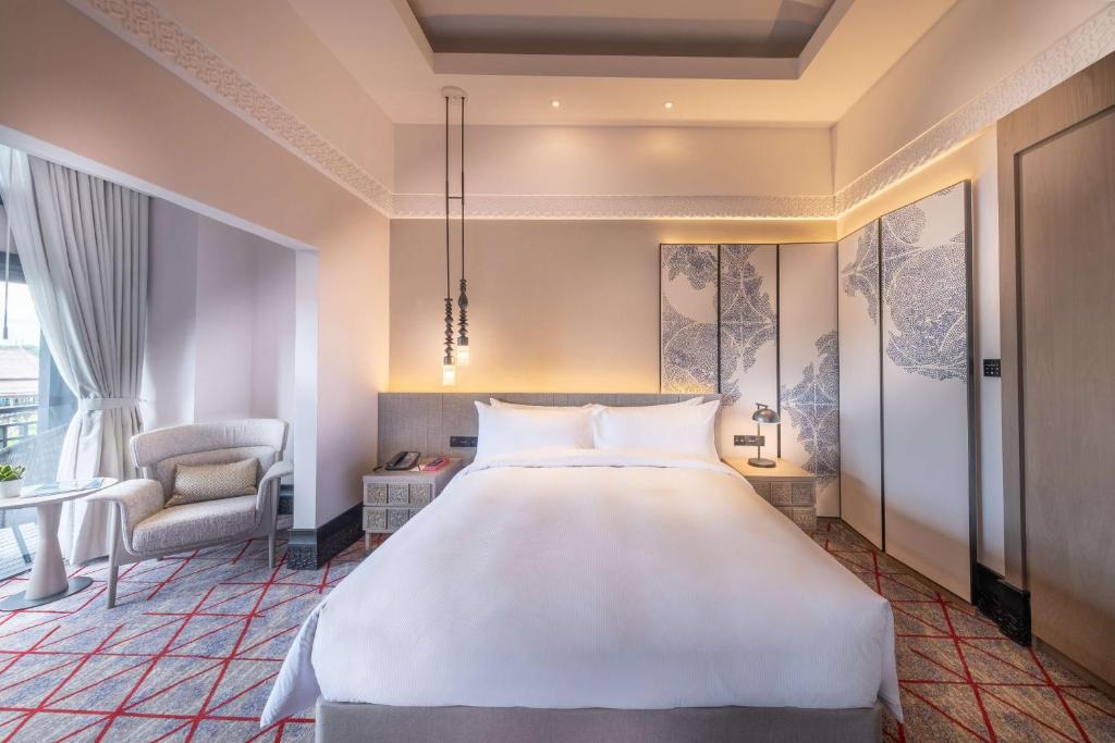 Cama o camas de una habitación en DoubleTree by Hilton Putrajaya Lakeside