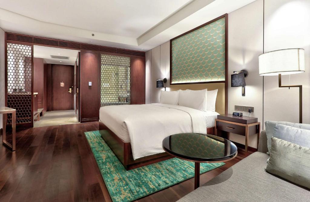 Postel nebo postele na pokoji v ubytování Hilton Da Nang