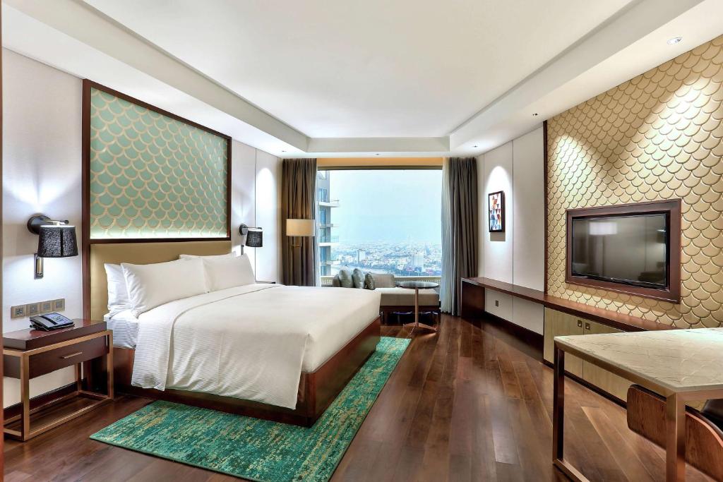 Postel nebo postele na pokoji v ubytování Hilton Da Nang
