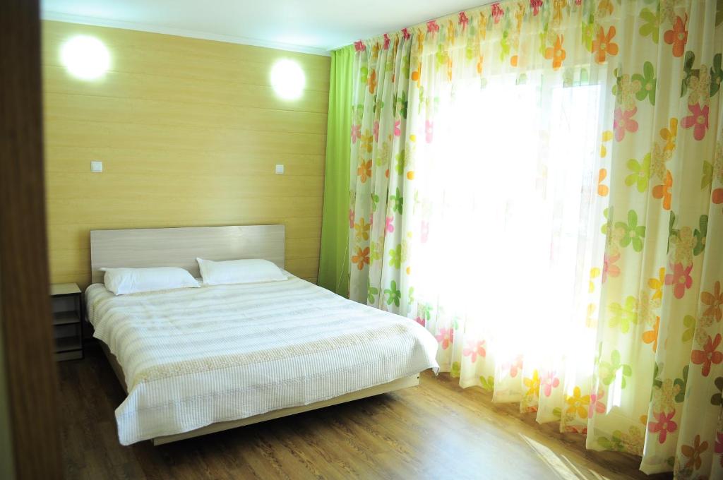 Postel nebo postele na pokoji v ubytování Dome Hotel