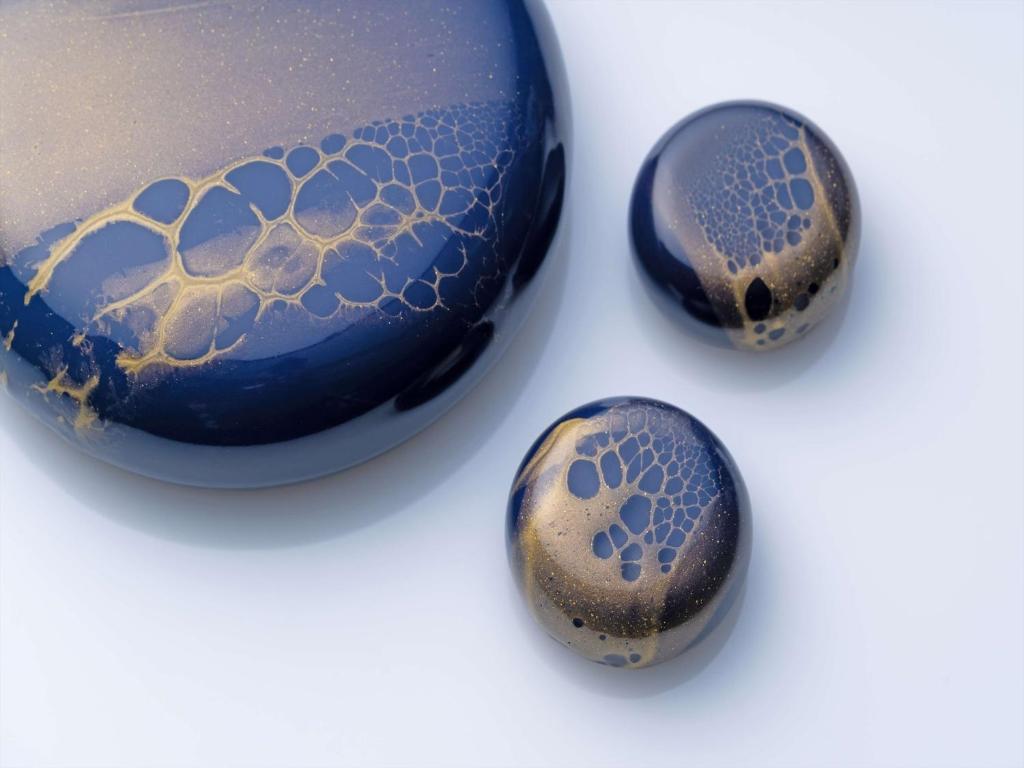 a group of three vases with patterns on them at Conrad Osaka in Osaka
