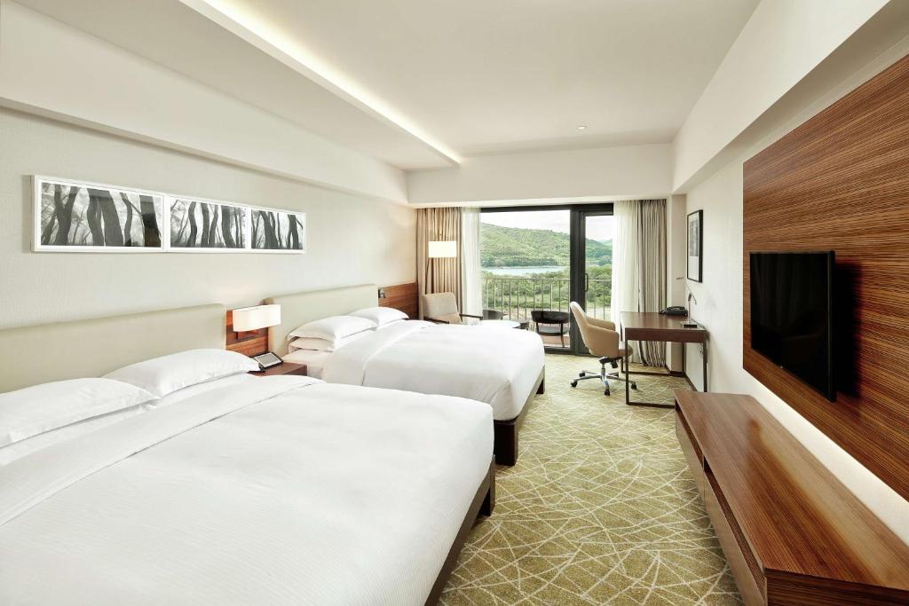 TV a/nebo společenská místnost v ubytování Hilton Gyeongju