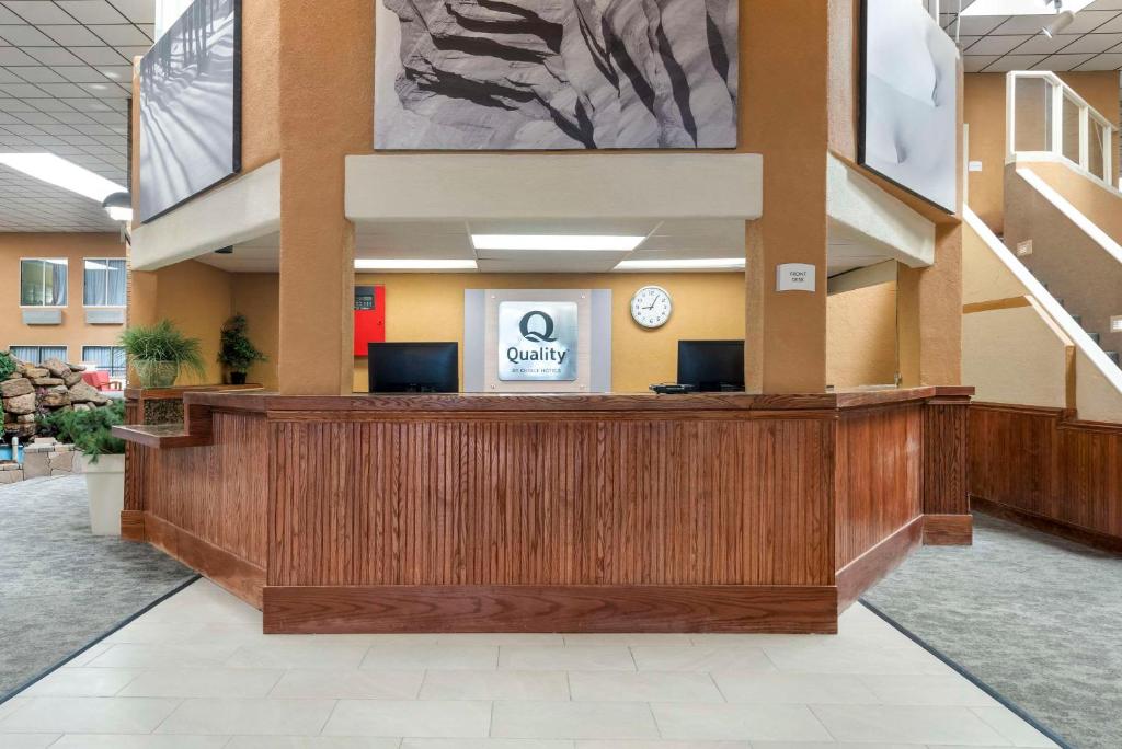 a lobby with a reception desk in a building at Quality Inn Alamosa in Alamosa