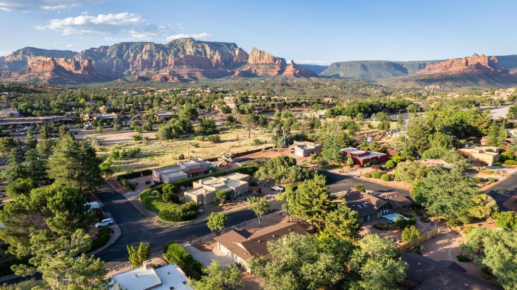 an aerial view of a town with mountains in the background at The Saddlerock House - Great Location, Views and Hot Tub! in Sedona