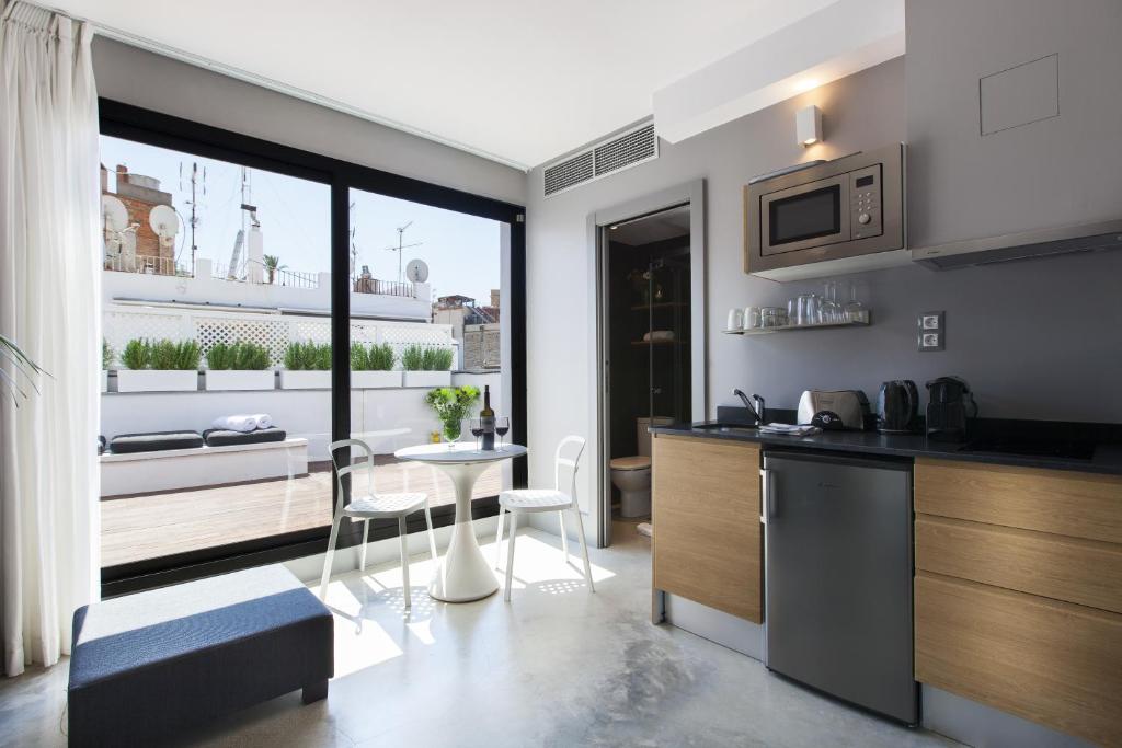 Kuchyň nebo kuchyňský kout v ubytování Kare No Apartments by Sitges Group