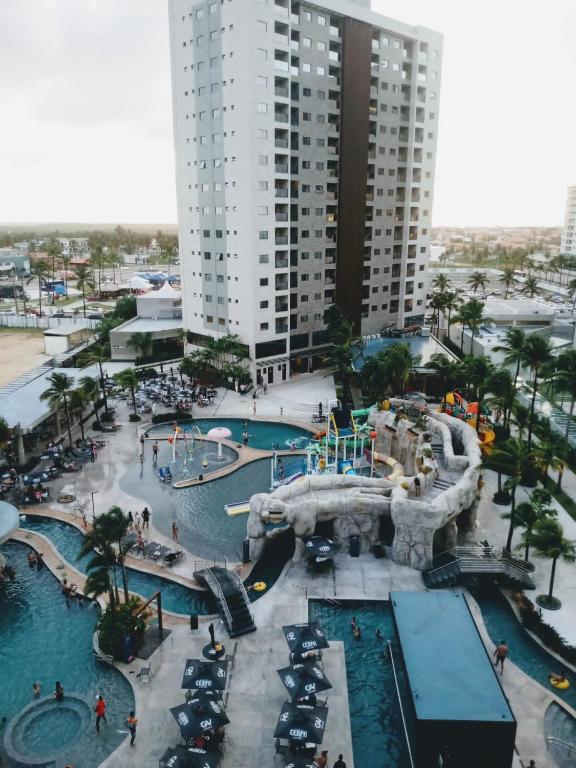 an indoor water park at a resort with a water slide at Salinas Premium Resort in Salinópolis