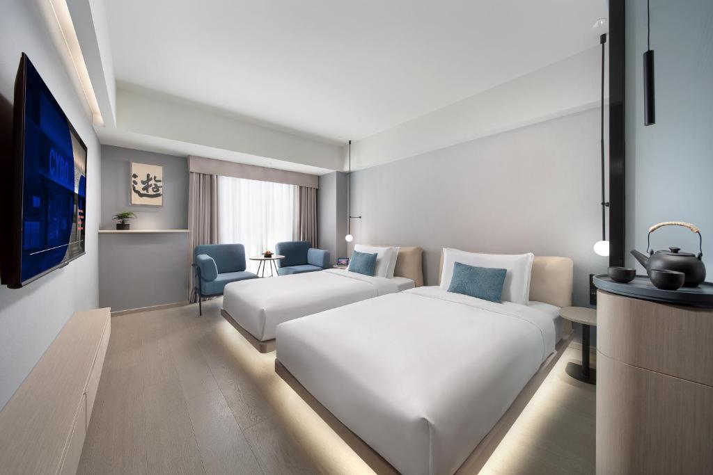 CYBO Station Luohu Shenzhen - Luxe Tweelingzaal