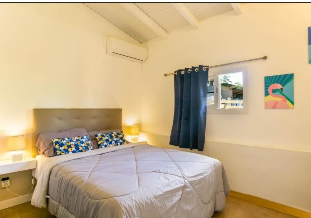 Postel nebo postele na pokoji v ubytování Kajoane's villa