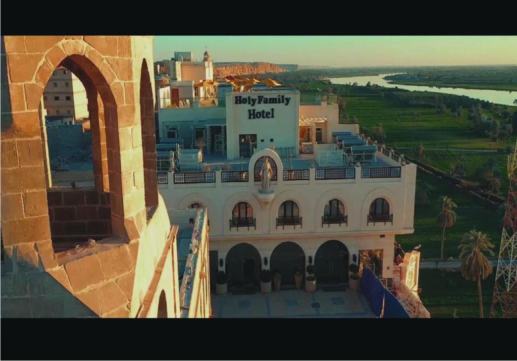 an aerial view of a large white building at Holy Family Hotel in Jabal aţ Ţayr