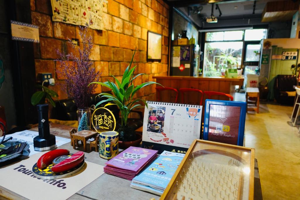 Posezení v ubytování Fuqi Hostel - Heping