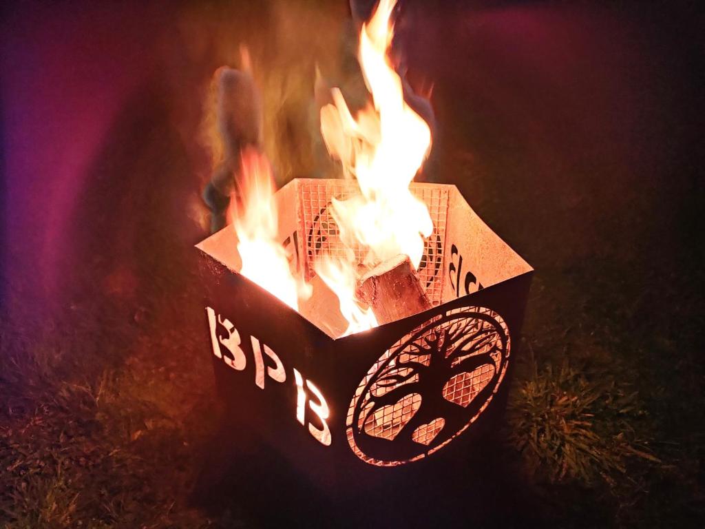 a box with fire inside of it with the words isles on it at Battle Pods and Bells in Battle