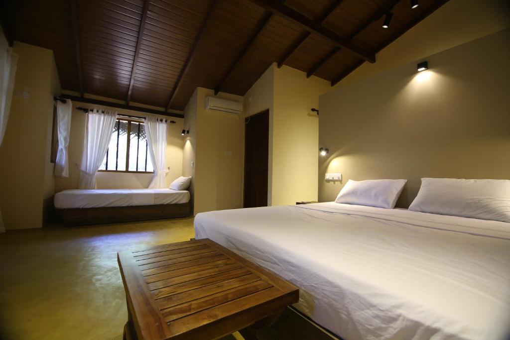 Postel nebo postele na pokoji v ubytování Cloud Nine Lanka Resort Wilpattu