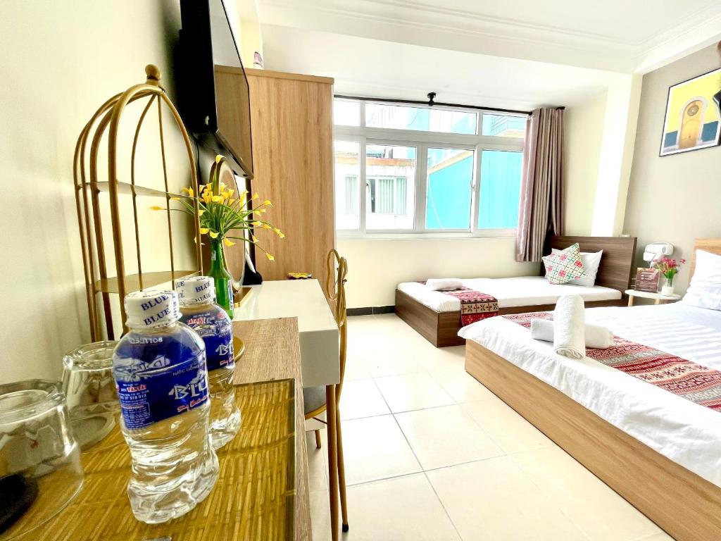 Posteľ alebo postele v izbe v ubytovaní Jasmine Hotel