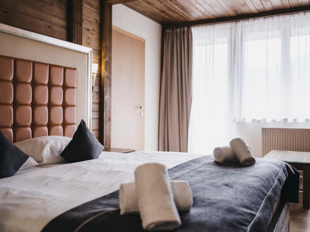 Postel nebo postele na pokoji v ubytování Hotel Victoria by VAYA