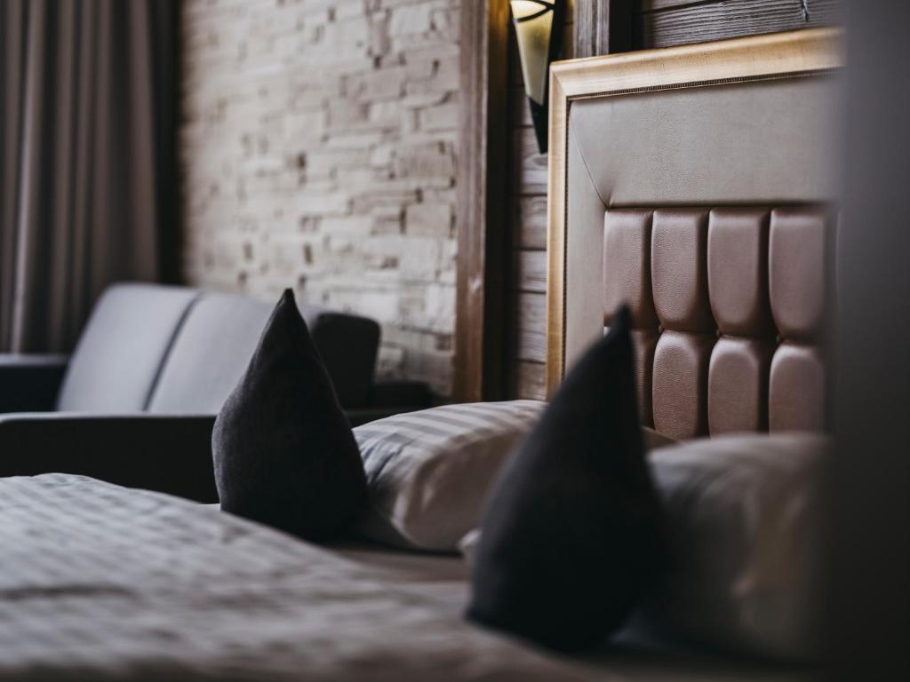 Postel nebo postele na pokoji v ubytování Hotel Victoria by VAYA