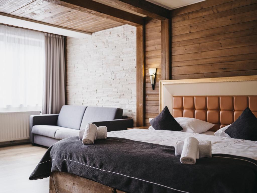 Postel nebo postele na pokoji v ubytování Hotel Victoria by VAYA