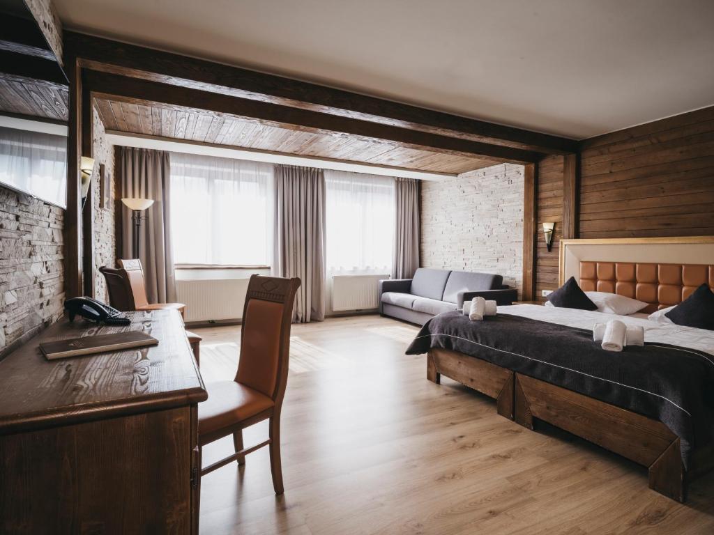 Postel nebo postele na pokoji v ubytování Hotel Victoria by VAYA