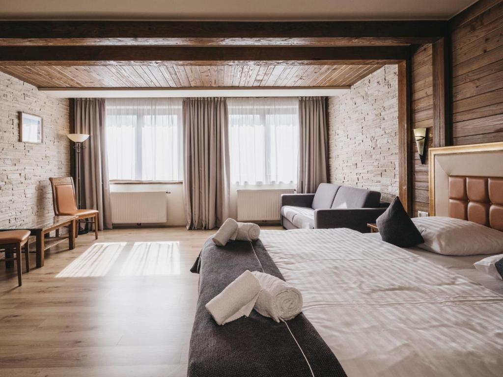Postel nebo postele na pokoji v ubytování Hotel Victoria by VAYA