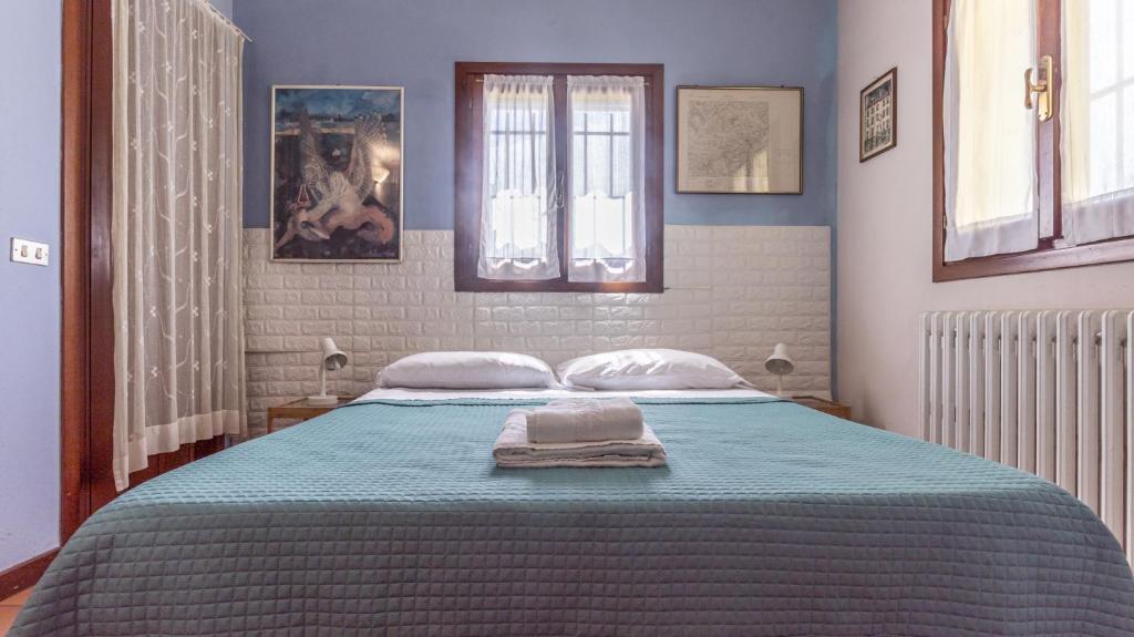 Postel nebo postele na pokoji v ubytování 3T - Affitti Brevi Italia