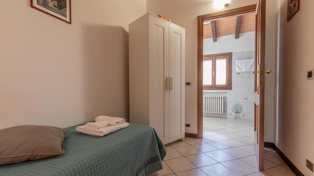Postel nebo postele na pokoji v ubytování 3T - Affitti Brevi Italia