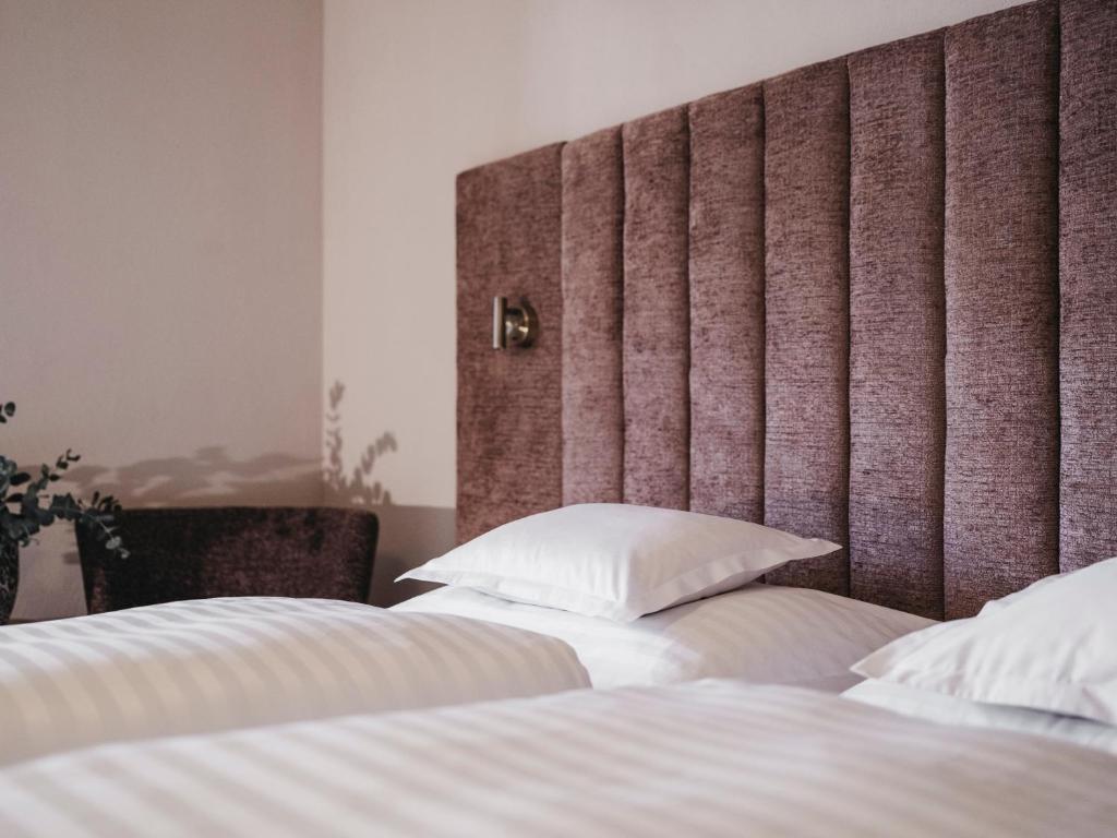 Postel nebo postele na pokoji v ubytování Hotel Chesa Monte 4Sterne Superior