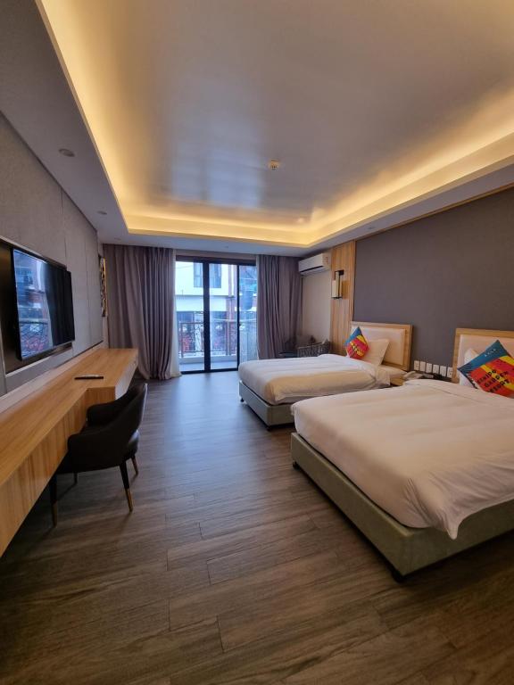 Postel nebo postele na pokoji v ubytování El Nido Garden Resort