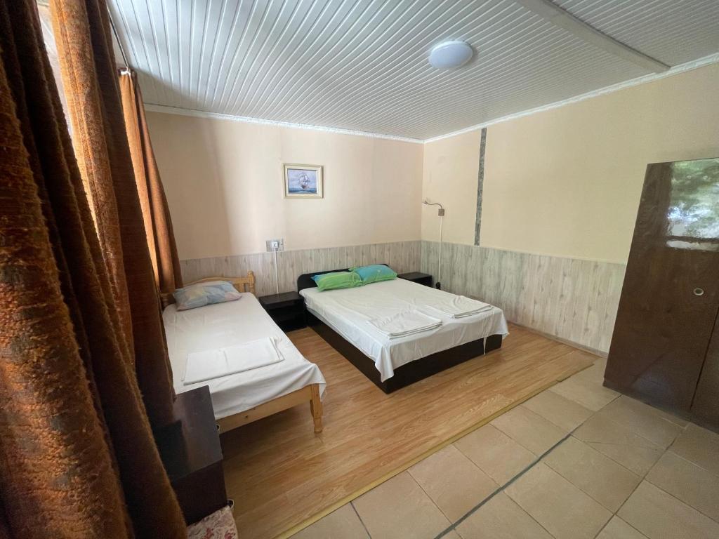 Postel nebo postele na pokoji v ubytování Bungalow Silitur