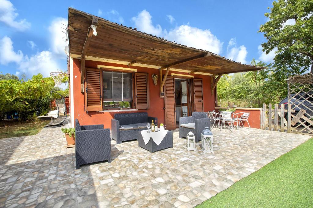 Casa Pergolato a Sorso - Accogliente Oasi con Giardino