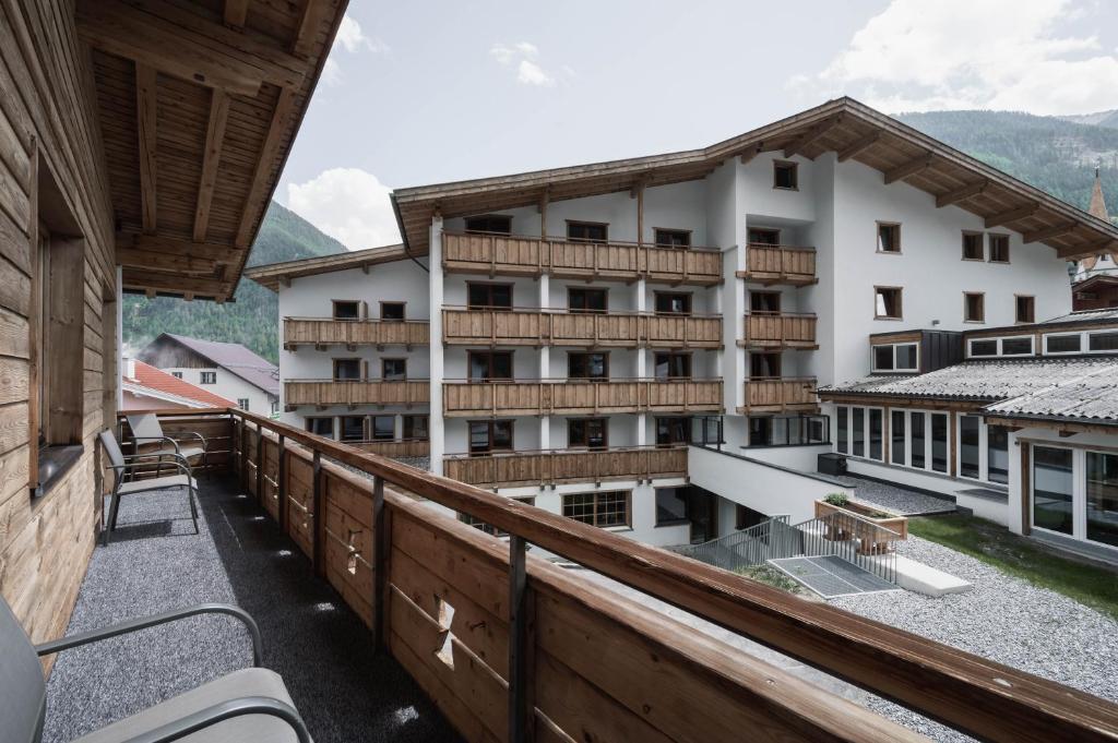 a balcony with a view of a building at Chalet Pfunds in Pfunds