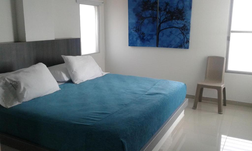 Postel nebo postele na pokoji v ubytování Hotel Onix T