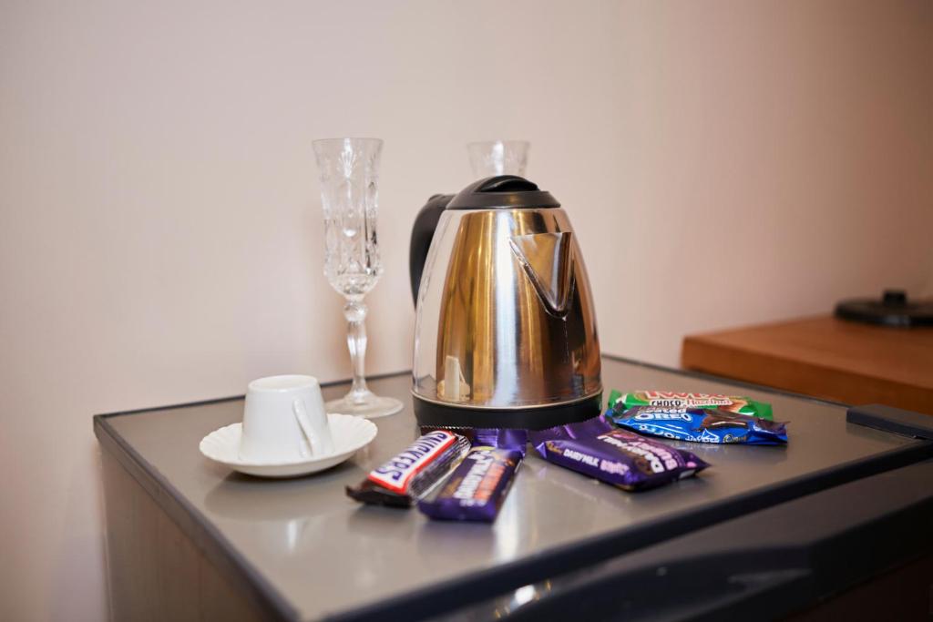 Příslušenství pro přípravu čaje a kávy v ubytování Grand Pyramid View Hotel